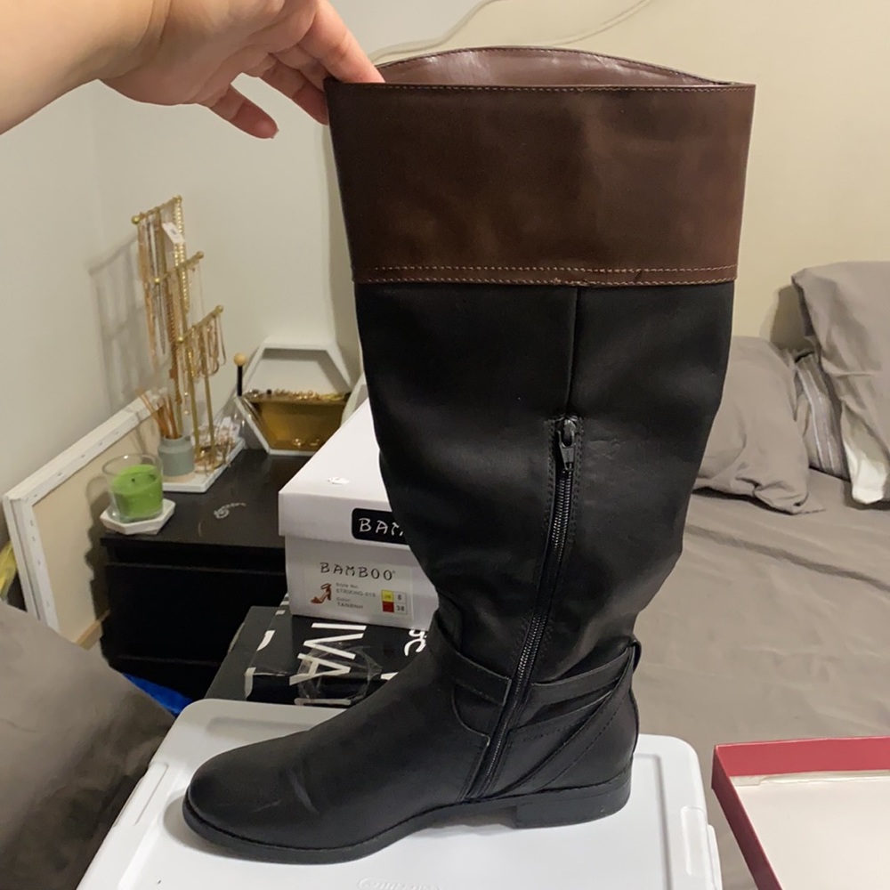 Wide calf two toned riding boots.
